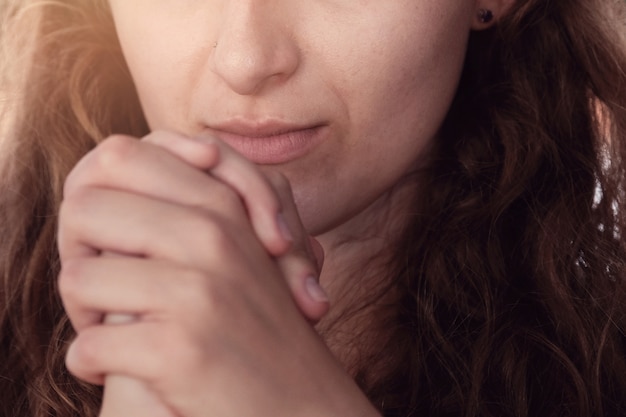 Young woman praying