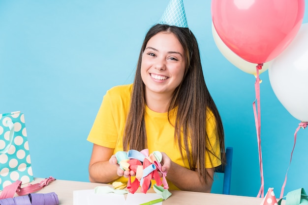 Young woman preparing a birthday party