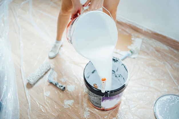 Young woman preparing the paint