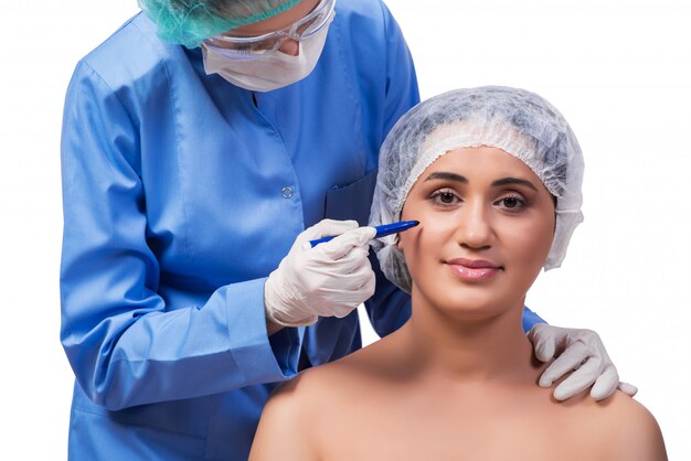 Young woman preparing for plastic surgery isolated