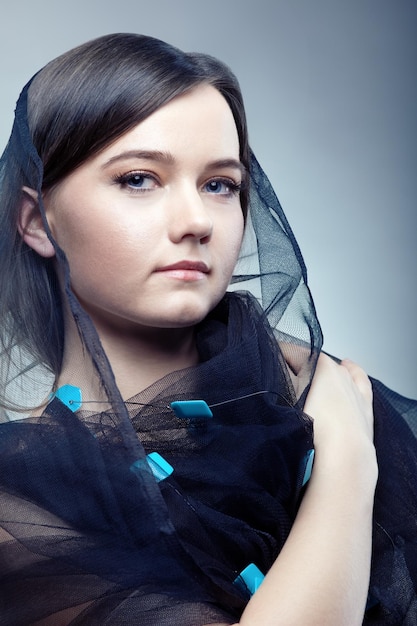 Young woman in pretty veil