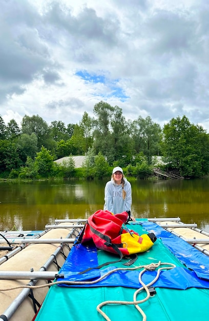 Young woman rafting on the river