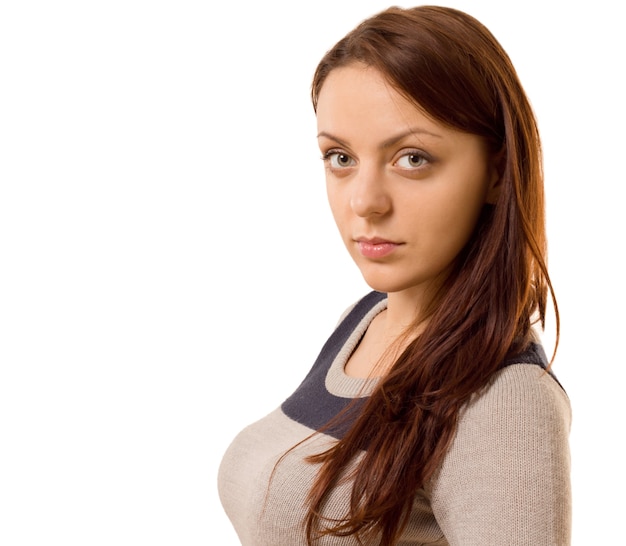 Young woman raising an eyebrow at the camera