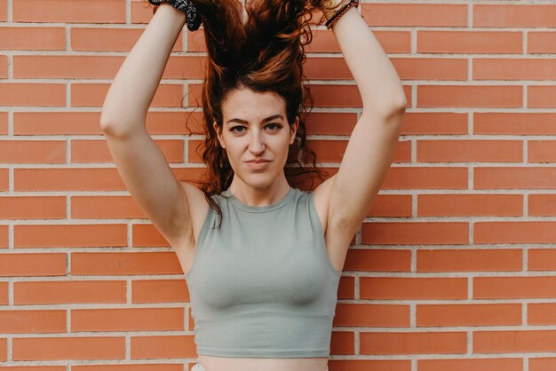 Young woman raising her hair Hair loss