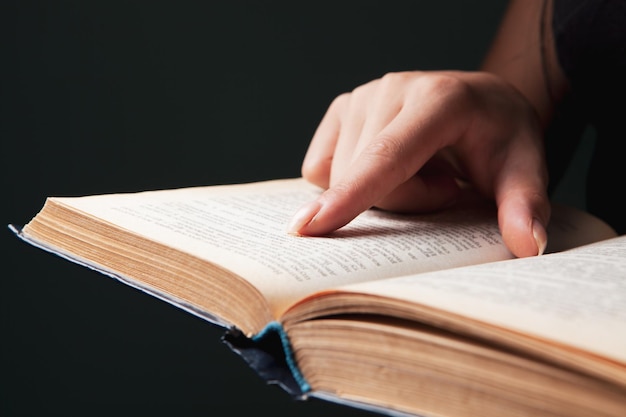 Young woman reading a book