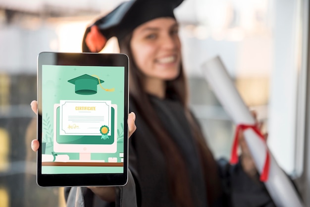 Young woman receiving her diploma on a tablet