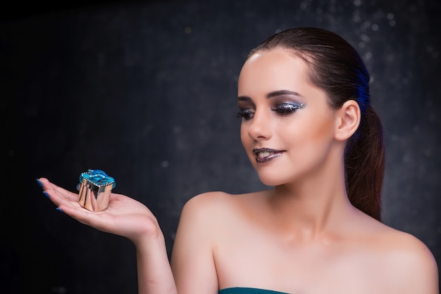 Young woman receiving proposal with diamond ring