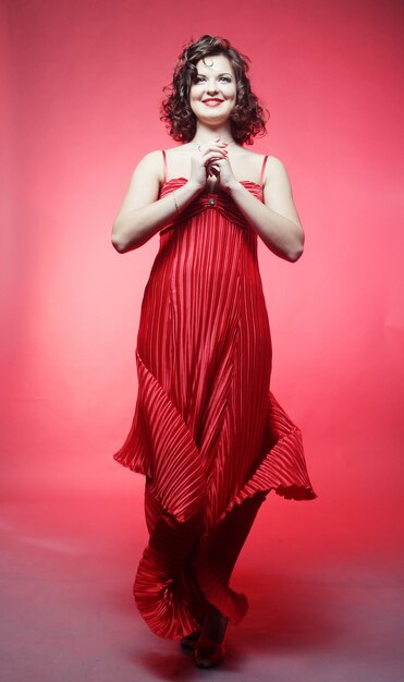 Photo young woman in red dress