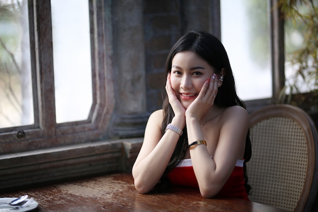 Young woman in red santa costume