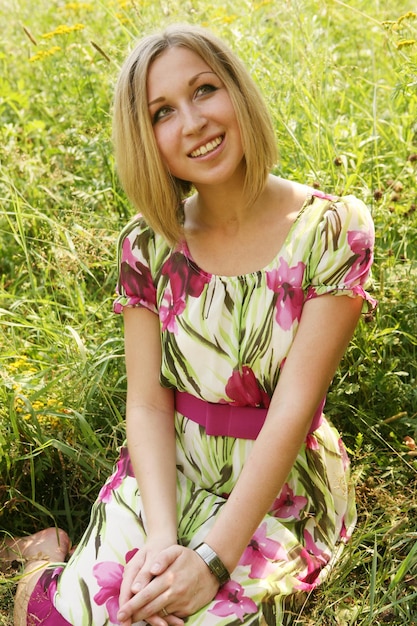 Young woman relaxing in the grass