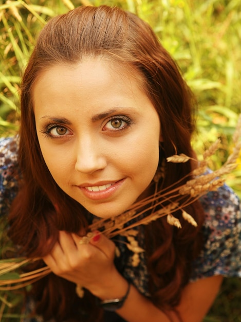 Young woman relaxing in the grass