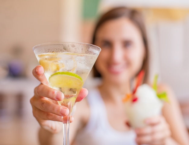 young woman in a resort with cocktail