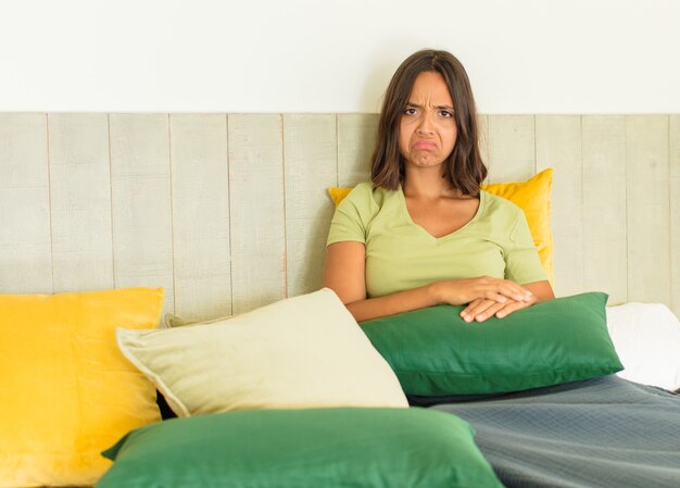 young woman resting into a bed