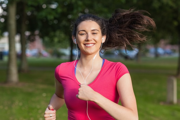 Young woman running in a park