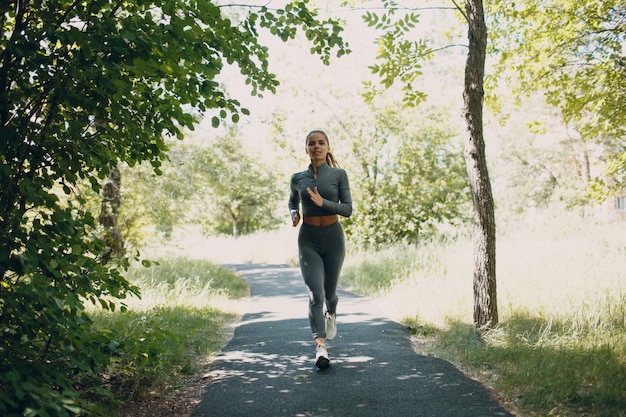 Young woman running in the park