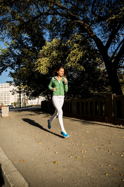 Young woman running in the park