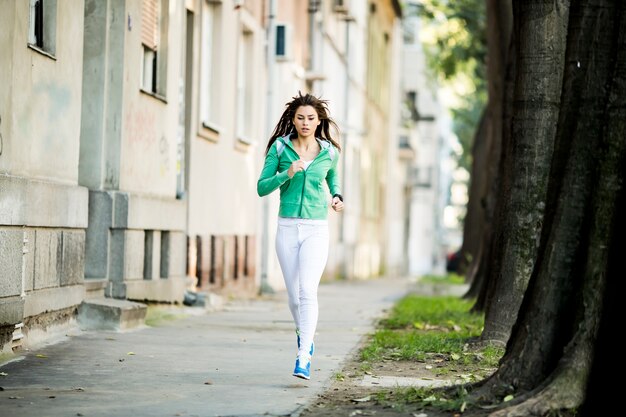 Young woman running in the park