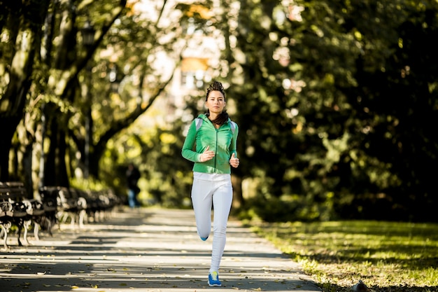 Young woman running in the park