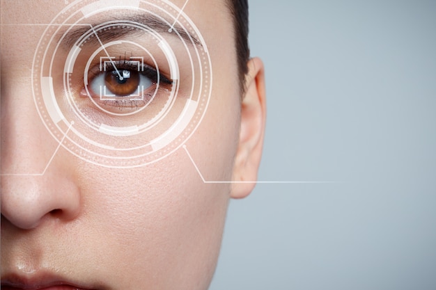 The young woman 's eye is close-up. the concept of the new
technology is iris recognition.