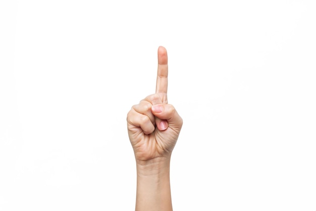 A young woman's hand points up at a copy empty blank space for text and design on a white background