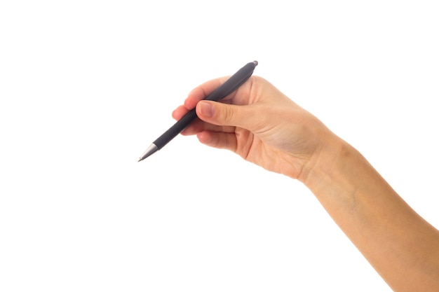 Young woman's hand using a black pen on white background in studio