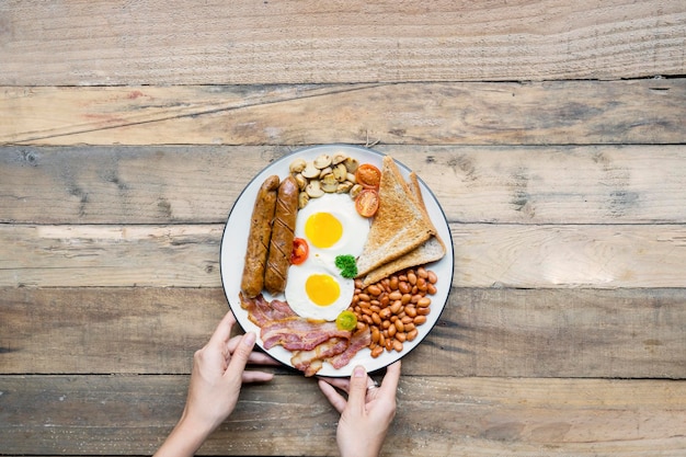 Young woman serving tasty breakfast