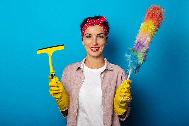 Young woman in shirt with cleaning gloves