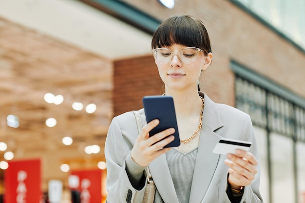 Young Woman Shopping in App