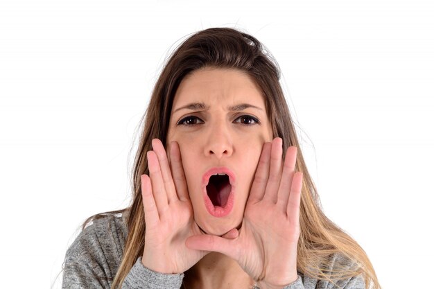 Young woman shouting and screaming