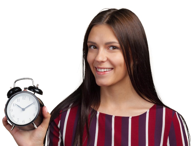 Young woman showing alarm clock