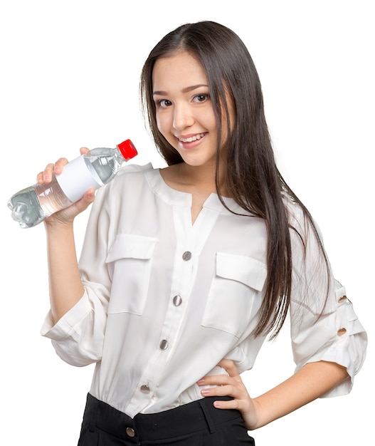 Young woman showing a bottle of water