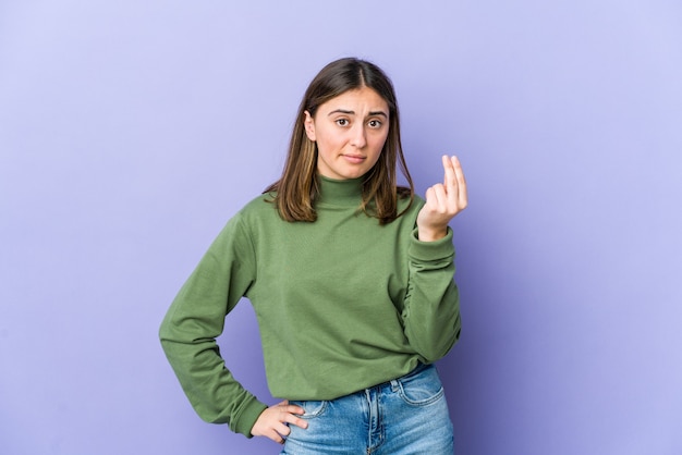 Young woman showing that she has no money