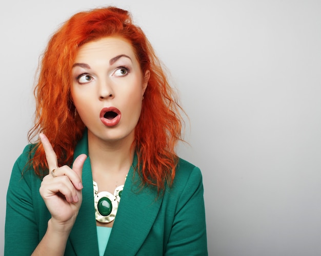 Young woman showing thumbs up gesture