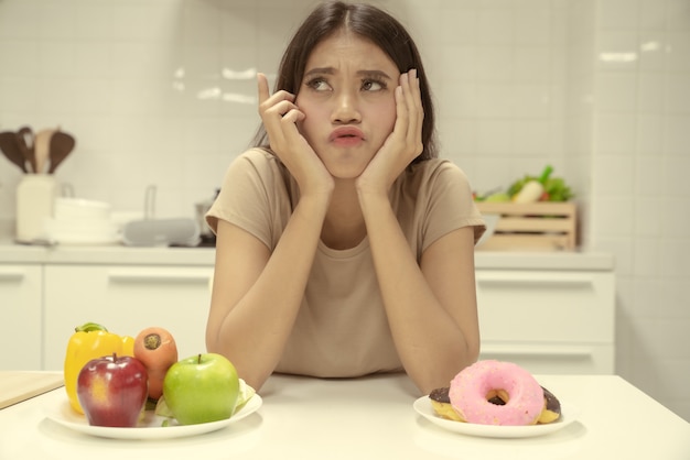 Young woman sitting at a table