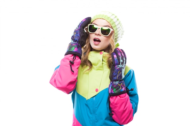 Young woman in ski suit and sunglasses