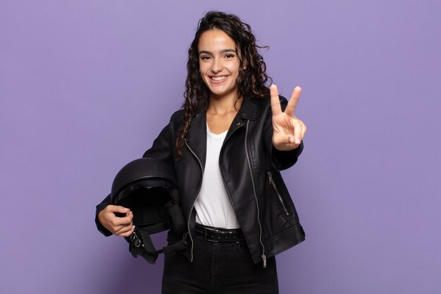 Young woman smiling and looking happy