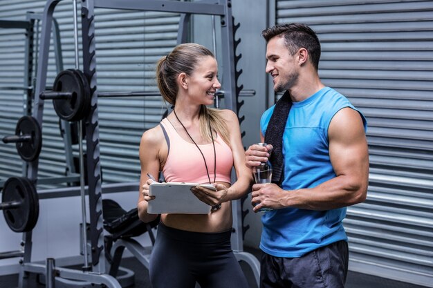 Young woman smiling at a young man