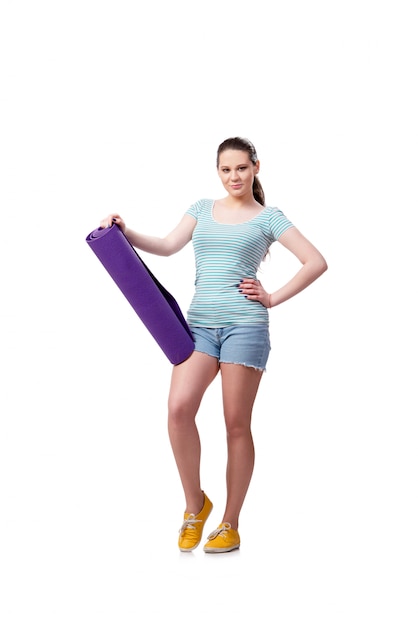 Young woman in sports concept isolated on the white