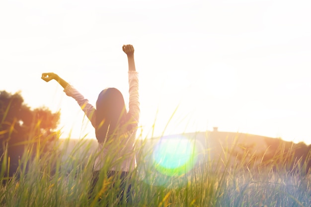 Young woman standing at relax pose or freedom pose or chill pose