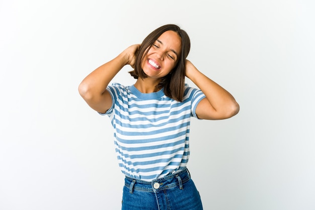 Young woman stretching arms, relaxed position