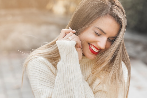 Young woman in stylish sweater