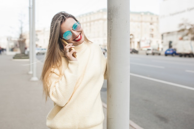 Young woman in stylish sweater