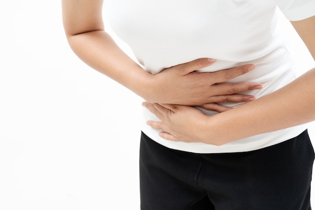 Young woman suffer from abdominal pain feeling stomach ache, symptom of pms