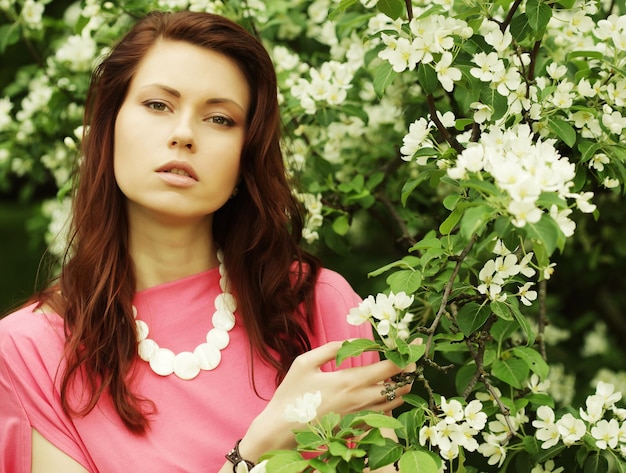 Young woman in summer park