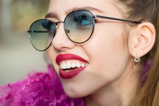 Young woman in sunglasses