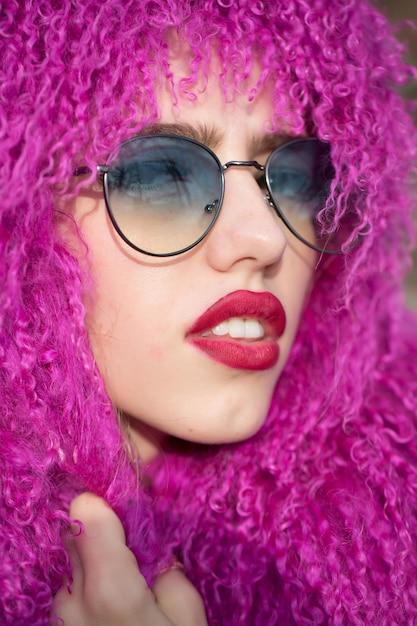 Young woman in sunglasses