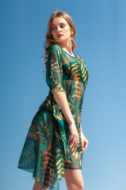 Young woman on the sunny beach