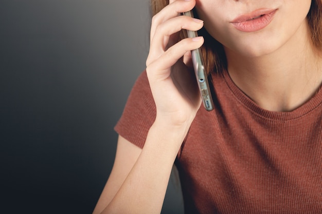 Young woman talking on the phone