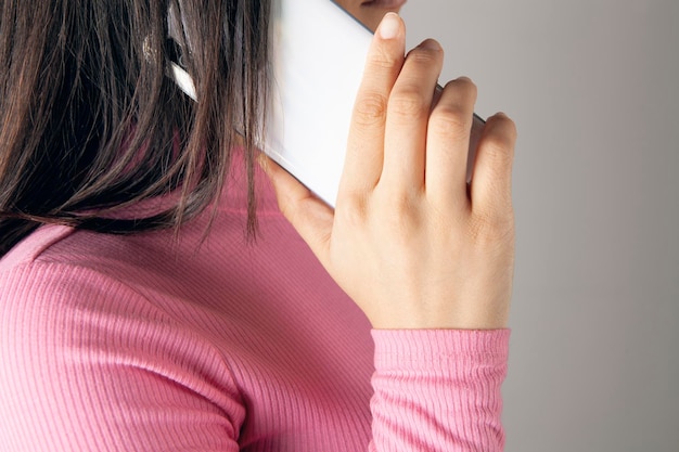 Young woman talking on the phone