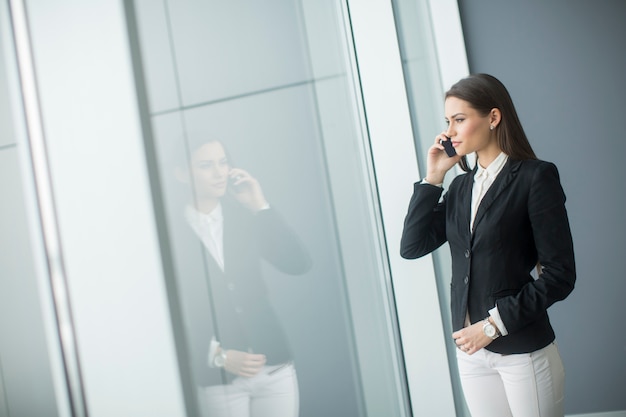 Young woman talking on the phone